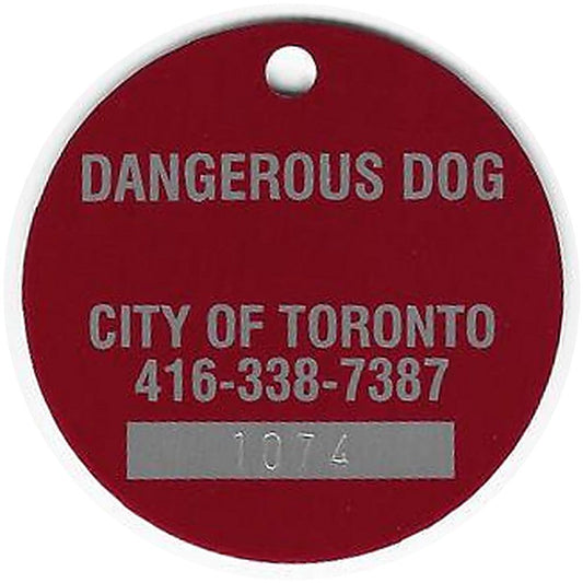 Custom Dangerous Dog tag — the back is where you personalize the four lines including a 4-character engraved serial in the aluminum bar